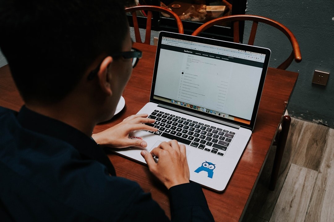 person learning to code on laptop