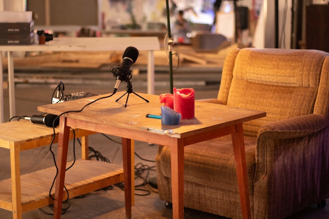 New podcast recording kit with microphone headphones and mixer on a table