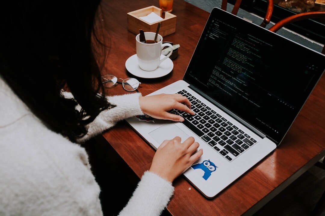 person learning programming on laptop